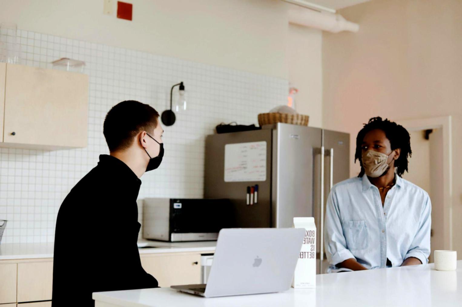 Business professionals reviewing financial documents and charts