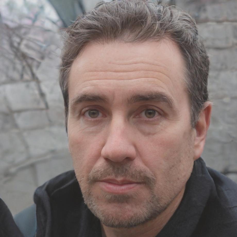 Professional headshot of business finance instructor