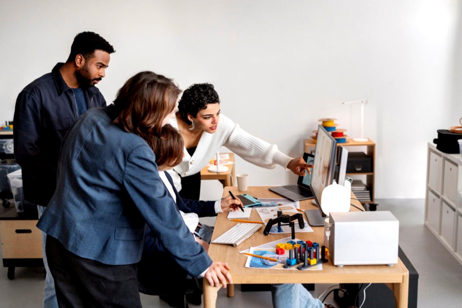 Small business owner reviewing financial statements at desk